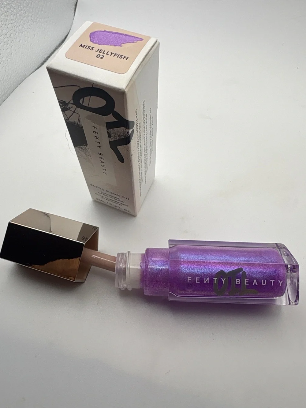 Fenty Beauty Gloss Bomb Oil- Iridescent Purple Shimmer Miss Jellyfish 02-NEW